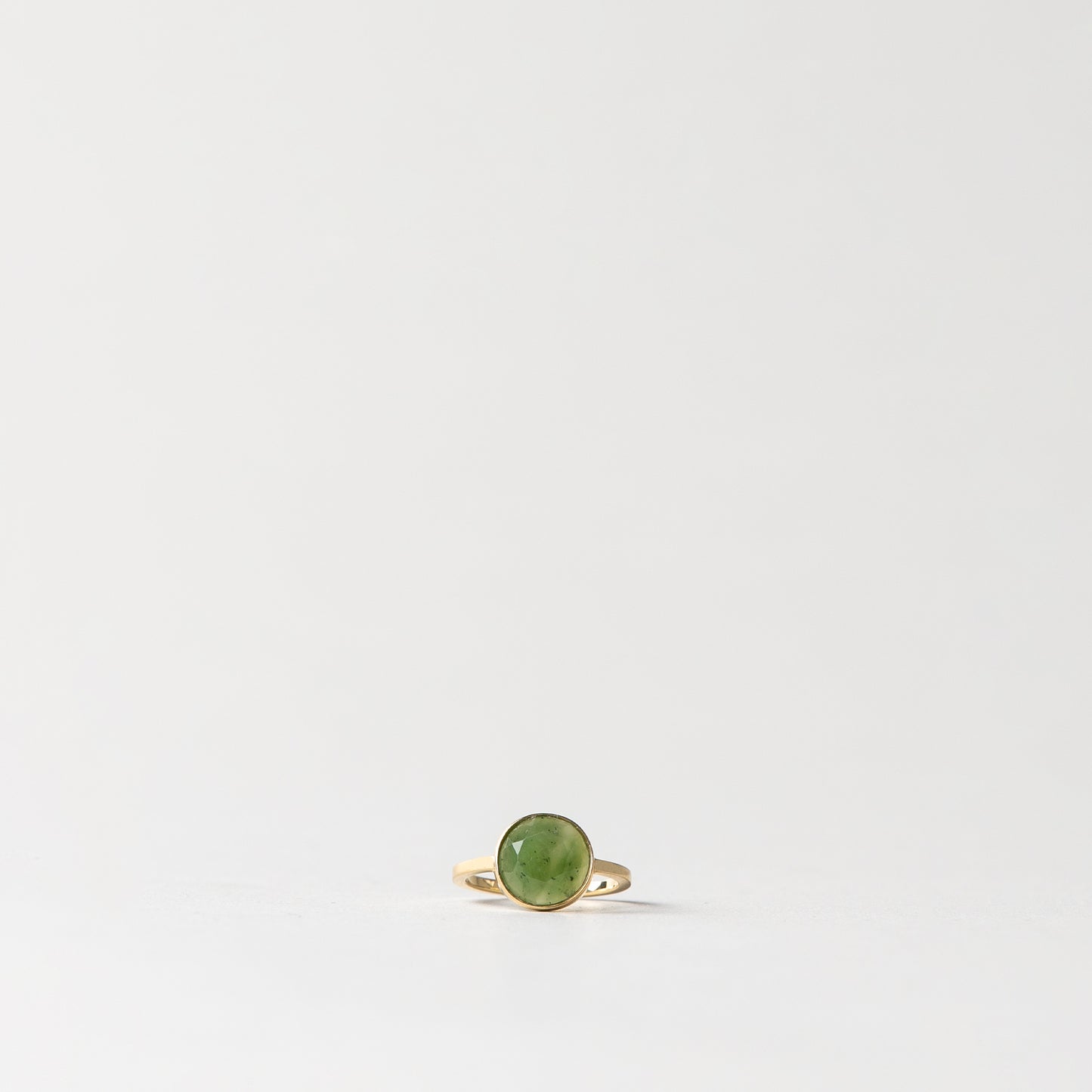 CHARMED ROUND GREEN JADE RING