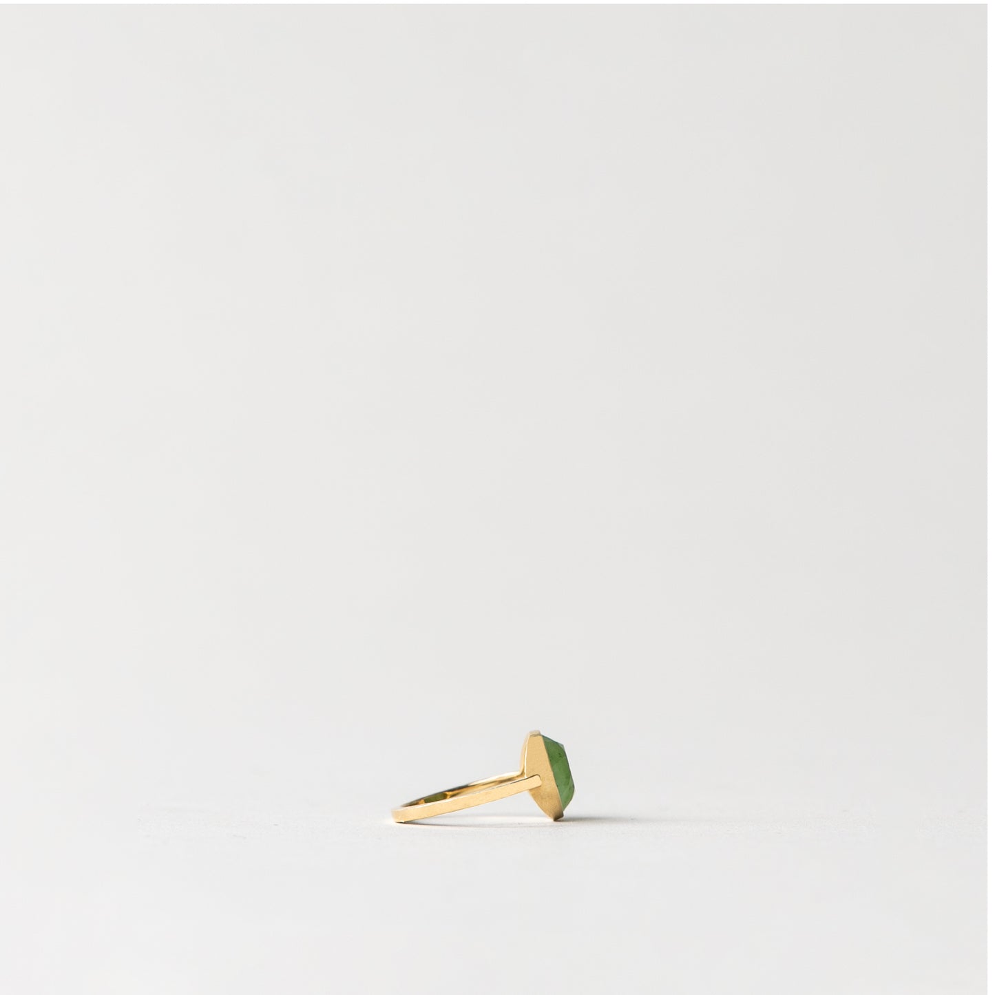 CHARMED ROUND GREEN JADE RING