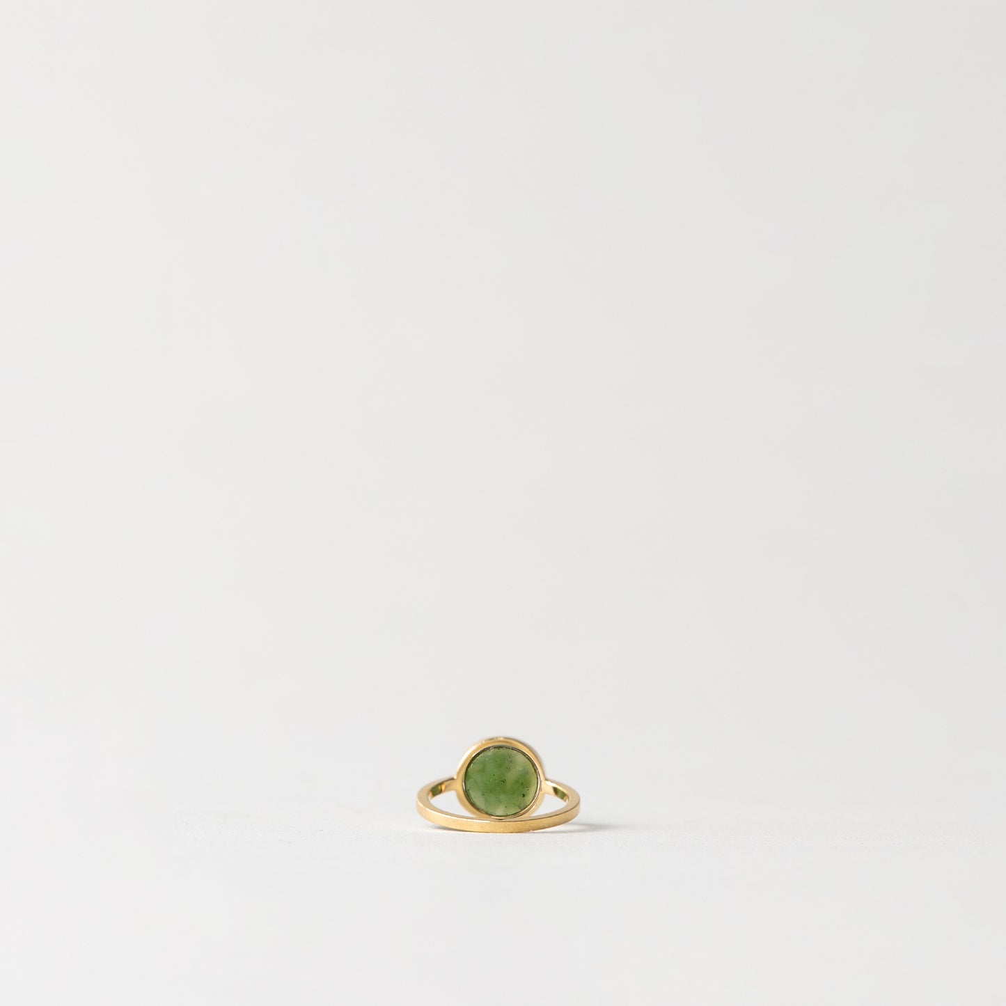 CHARMED ROUND GREEN JADE RING