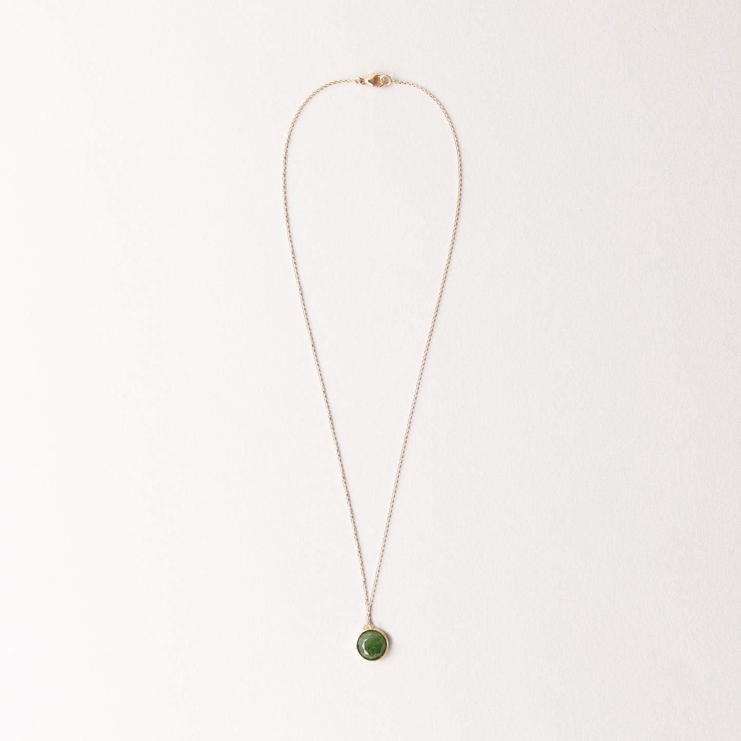 CHARMED ROUND GREEN JADE CHARM NECKLACE