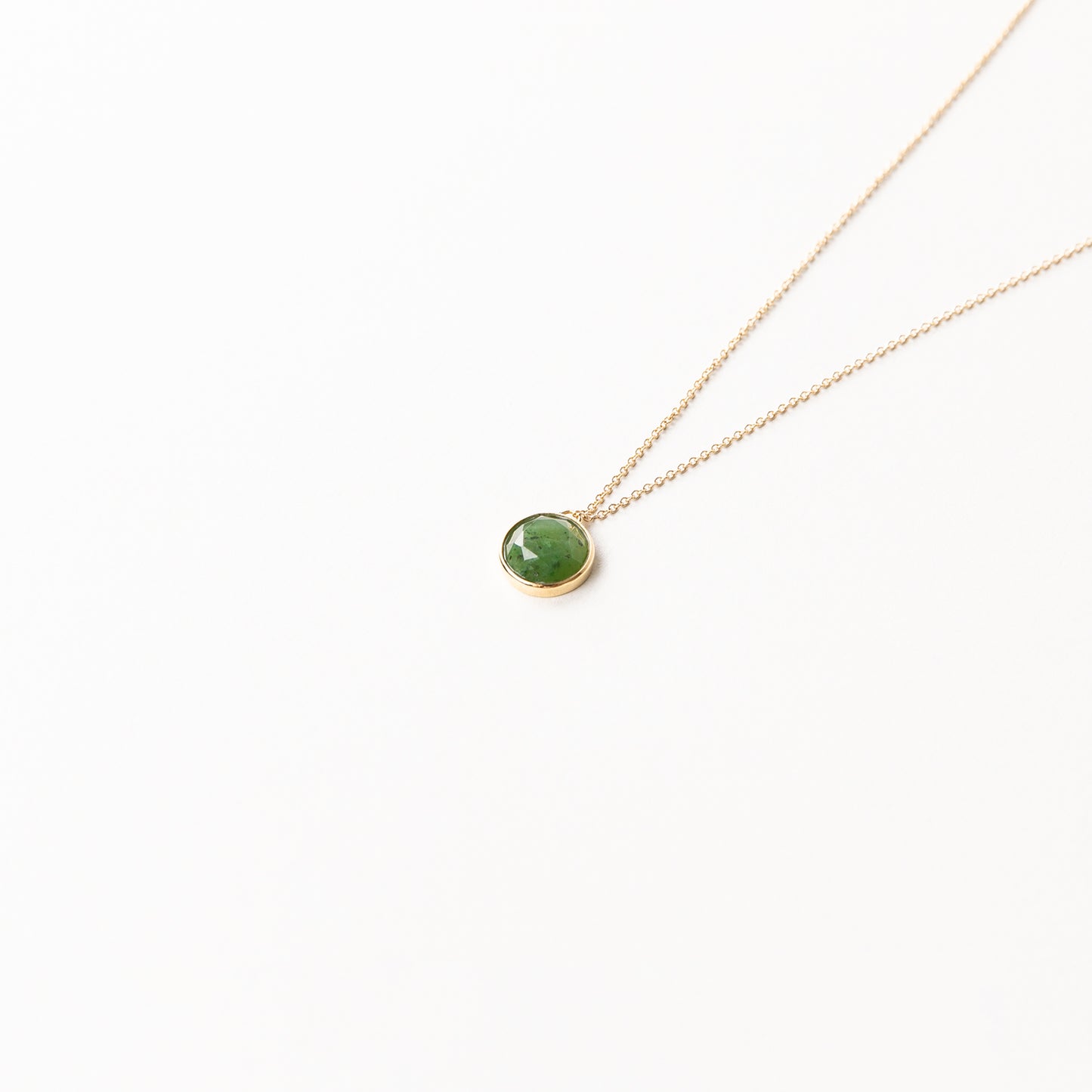 CHARMED ROUND GREEN JADE CHARM NECKLACE